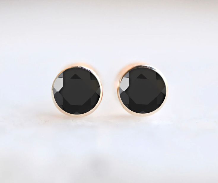 Lovely genuine black onyx is set in 14k gold. Lightweight and gorgeous, these are a great gift for anyone on your list. Perfect for everyday wear or for those who like to make a dainty minimalist statement. These also make a stunning gift for a special occasion. Hard to go wrong with these. Size : choose from dropdown Metal : 14kt Gold Gemstones : Genuine Black Onyx Packaging : All products purchased from us come in a gift box. If you need to include a message, kindly leave us a note when purcha Minimalist Black Earrings For Anniversary, Minimalist Black 14k Gold Earrings, Diamond Stacks, Minimalist Chic, Natural Diamond Ring, 18k Gold Ring, Everyday Rings, Gemstone Studs, March Birth Stone