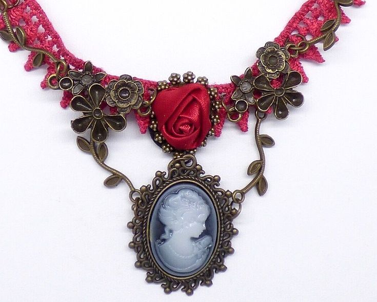 Cameo Red Rose Flower Lace Choker Necklace Earring Set Bronze Tone Metal Beads Vintage Red Jewelry For Gifts, Handmade Rose Jewelry For Gifts, Valentine's Day Beaded Jewelry Gift, Decorative Pink Jewelry Gift, Elegant Red Decorative Jewelry, Bohemian Beaded Jewelry For Valentine's Day, Bohemian Cameo Jewelry For Gifts, Bohemian Jewelry With Rose Design For Gift, Vintage Red Beaded Jewelry