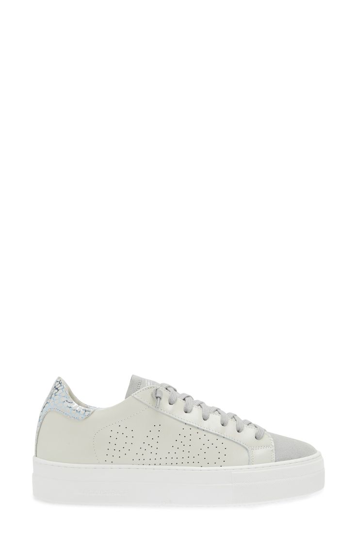 An iconic logo perforates the side of this low-top sneaker set on a platform sole and elevated with flat laces and a tonal finish. Lace-up style Leather upper and lining/rubber sole Made in Italy Trendy Platform Sneakers With Perforations And White Sole, Trendy Platform Sneakers With Perforated Toe Box For Sports, Trendy Platform Sneakers With Perforations, Trendy Sneakers With Perforated Toe Box For Streetwear, Trendy Streetwear Platform Sneakers With Perforated Toe Box, Trendy Perforated Sneakers For Streetwear, White Sole Sneakers With Perforations And Round Toe, Trendy White Sneakers With Perforated Toe Box, Casual Synthetic Platform Sneakers With Perforations