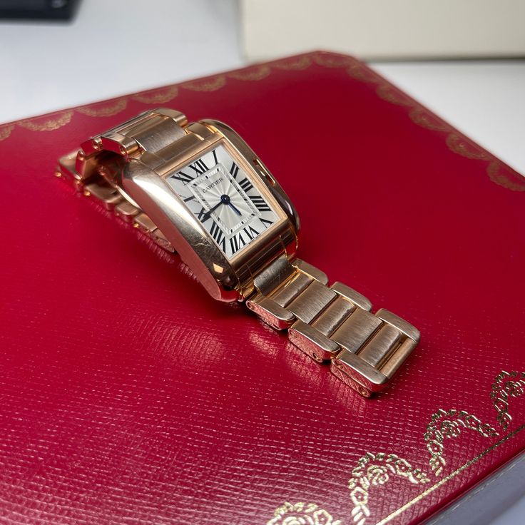 Pre-owned 18kt Rose Gold Cartier Tank Anglaise quartz watch with silver Roman numeral dial on Rose Gold Bracelet, with box & papers. Very good Condition. There are a few very light scratches on the case, and one scratch on the crystal near the 12:00 position. Cartier Tank Anglaise 40MM Quartz Movement Silver Dial Roman Numerals 18k Rose Gold Case 18k Rose Gold Bracelet Box & Papers Elegant Gold Cartier Watch Accessories, Cartier Analog Watch As Gift, Gift Cartier Analog Watch, Gift Cartier Watch, Luxury Cartier Analog Watches, Rose Gold Analog Watch For Formal Occasions, Rose Gold Analog Watch Accessories For Formal, Rose Gold Analog Watch Accessories For Formal Occasions, Rose Gold Analog Watch Accessories For Formal Events