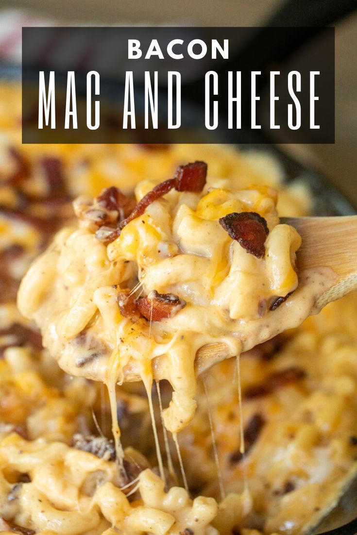 bacon macaroni and cheese is being lifted from a skillet