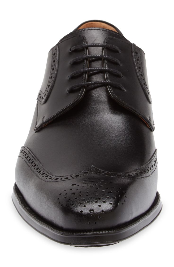 Classic broguing stipples the upper of a burnished-leather derby that adds clean grounding to your sophisticated styles. Lace-up style Cushioned footbed Leather upper and lining/rubber sole Made in Spain Elegant Goodyear Welted Lace-up Derby Shoes, Elegant Goodyear Welted Lace-up Derby, Classic Wingtip Derby For Semi-formal Occasions, Elegant Derby Shoes With Perforated Plain Toe, Elegant Oxfords With Perforated Almond Toe, Classic Semi-formal Derby With Wingtip, Elegant Round Toe Dress Shoes With Perforated Toe Box, Elegant Dress Shoes With Perforated Toe Box For Derby, Classic Semi-formal Wingtip Derby