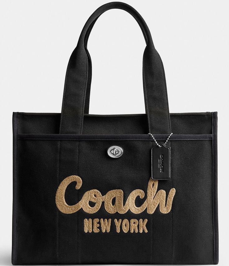 From COACH&#x2C; the Large Cargo Tote 42 Bag features:Canvas&#x2C; grosgrain&#x2C; and recycled leatherZip-top closureFabric liningOutside turn-lock and snap pocketsFits a 16" laptopHandles with 9" dropApprox.: 16.25" L x 12.25" H x 7.75" WImported. Coach Canvas Travel Bag, Coach Travel Bag In Canvas, Biological Diversity, Coach Tote Bag, Tote Bags For School, Luxury Bags Collection, Coach Tote Bags, Pearl Accessories, Coach New York