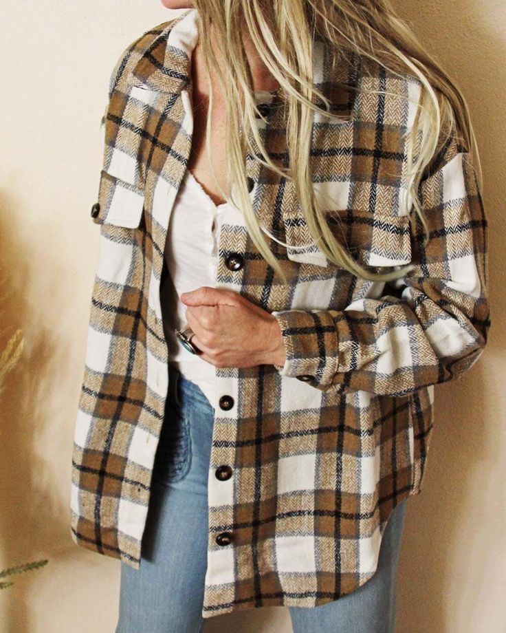 Bundle up in this cozy & comfortable shirt jacket. Made from the cutest woven plaid in tones of taupe, white & black. Perfectly oversized, this jacket has faux front pockets to ensure it does not look to bulky. Model is wearing a size small. So cute paired with jeans & boots & perfect layered for chilly weather. Color: Taupe, white & black Soft poly & cotton blend Hand wash cold Because of the time invested in each piece, all sales are final. Ships from our small family store in Washington State Fall Plaid Cotton Shacket, Beige Long Sleeve Flannel Shirt For Fall, Cozy Fall Shacket With Buttons, Casual Cream Button-up Shacket, Casual Cream Collared Shacket, Casual White Shacket With Button Closure, Casual White Shacket With Buttons, White Long Sleeve Shacket With Snap Buttons, White Collared Shacket For Everyday