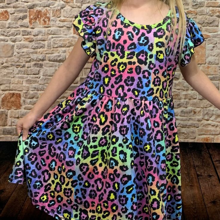 This Flutter Sleeve Dress Is Too Cute With The Tie Dye Colors And Animal Print! Sizes Available: 6/12m, 12/18m, 2t, 3t, 4t True To Size For Search Purposes Only: Girl Spring Clothes Girl Summer Clothes Girl Birthday Birthday Gift For Child Gifts For Kids Girl Boutique Toddler Toddler Clothes Girl Outfits Girl Boutique Clothes Girl Clothes Kid Outfit Girl Dress Rainbow Leopard Multicolor Ruffle Twirl Dress For Playdate, Multicolor Ruffled Twirl Dress For Playdate, Casual Multicolor Twirl Dress For Spring, Playful Black Summer Dress, Cute Multicolor Twirl Dress For Spring, Playful Rainbow Dress With Ruffles, Multicolor Twirl Dress For Summer Playdate, Multicolor Twirl Dress For Playdate In Summer, Playwear Short Sleeve Twirl Dress With Ruffles