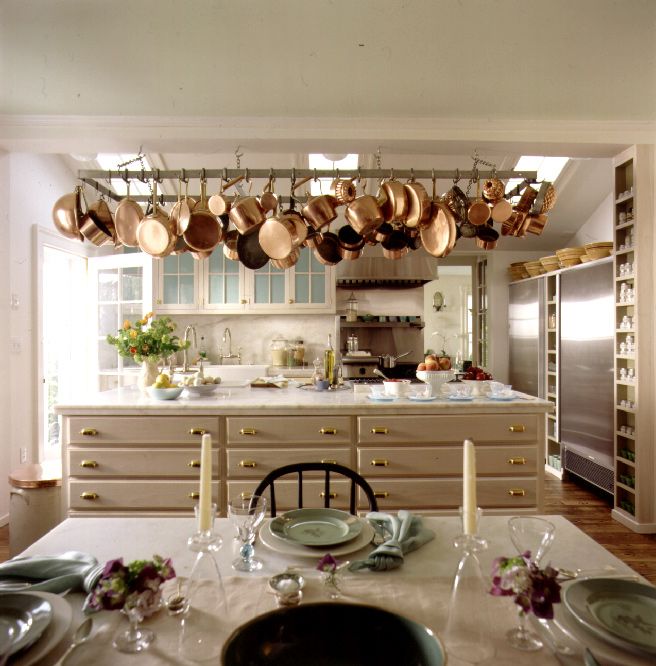 a kitchen filled with lots of pots and pans