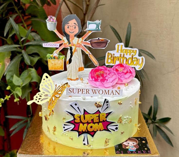 a birthday cake with an image of a woman on top and decorations around the edges