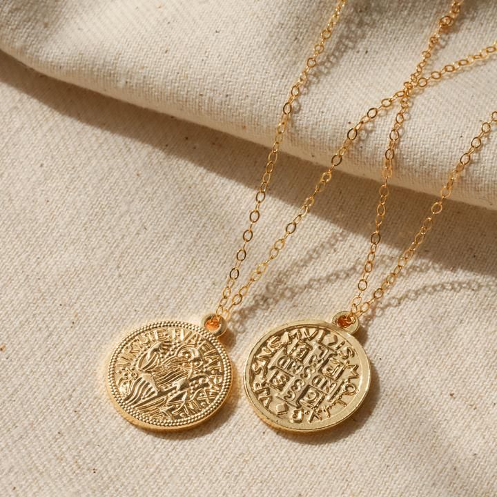 This is a coin pendant necklace made out of high quality gold filled and gold plated materials and perfect for everyday wear! You can layer with other gold necklaces or wear it alone as statement jewelry. The cute medallion says "Virtvte Tva Fiat Pax In" (‚ÄúMay there be peace in your strength") on the front. Staple Necklace, Coin Necklace Gold, Gold Coin Necklace, Gold Filled Necklace, Gold Medallion, Chic Necklace, Coin Pendant Necklace, Medallion Necklace, Gold Coin