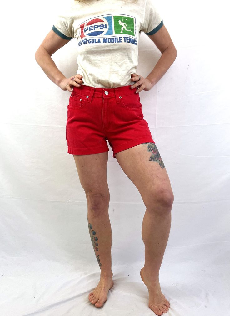 Love these... Perfect for summer. Zipper fly. 90s era... So fun! Size 7/8 100% cotton Made in Kenya Lying flat: Across waist : 14" across hips: ~19" Top to bottom: ~12" Cotton Jean Shorts For Summer Streetwear, Y2k High Waist Cotton Shorts, Summer Cotton Y2k Shorts, Y2k Style Cotton Shorts For Summer, Summer Cotton Mid-rise Shorts, Cotton Y2k Shorts For Summer, Fitted High Waist Cotton Jean Shorts, Y2k Style Cotton Shorts For Spring, Summer Mid-rise Cotton Shorts