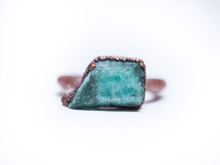 Rough emerald ring | Raw Emerald birthstone ring | Raw stone jewelry | Raw emerald jewelry | Raw emerald ring | May birthstone jewelryThis listing is for one large emerald crystal electroformed to a hand-hammered 12 gauge recycled copper ring. If your size is unavailable, please select “custom” from the drop down menu and indicate the size you need at check out.Our jewelry is unique and one-of-a-kind. Please note there will likely be variances in the size, shape and color of each stone. All elem Adjustable Emerald Promise Ring, Unique Emerald Ring For May Birthstone, Handmade Green May Birthstone Ring, Handmade Emerald Crystal Promise Ring, Unique Green Jewelry With Raw Stone, Handmade Green Birthstone Promise Ring, Emerald Rings With Natural Stones For May Birthstone, Unique Emerald Crystal Ring With Gemstone, Green Emerald Ring With Natural Stones