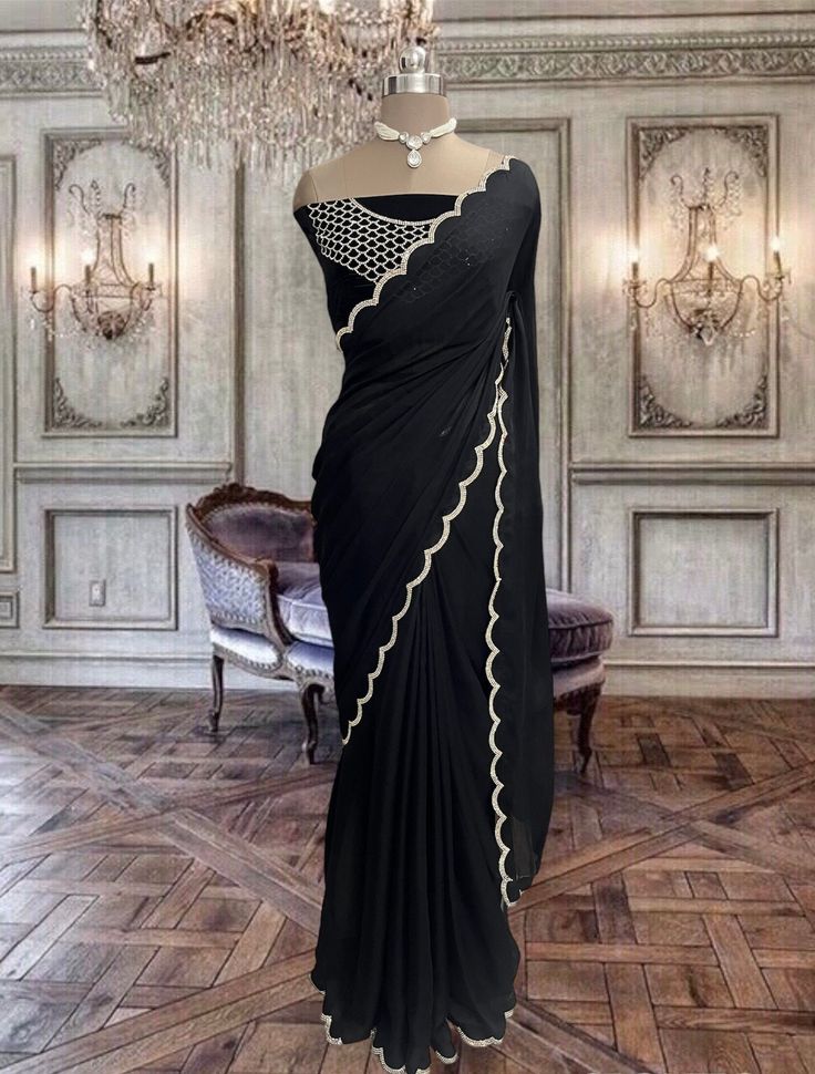 Beautiful black chinon georgette saree with stone and cutwork and running blouse piece Festive Black Pre-draped Saree With Cutdana, Black Georgette Pre-draped Saree With Resham Embroidery, Black Pre-draped Saree With Cutdana, Elegant Pre-draped Chiffon Saree, Designer Black Saree With Pallu, Designer Black Saree With Pallu Detail, Pre-draped Chiffon Saree With Mirror Work, Elegant Pre-draped Georgette Saree With Mirror Work, Black Pre-draped Saree With Zari Work For Wedding