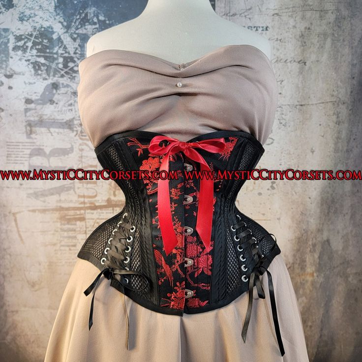 New UNDERBUST from "MystiC City Corsets" design: MCC-35 (sweetheart front) with hip ties black sport mesh/black-red bird brocade/black satin ORIGINAL design/photo: "MystiC City Corsets" front length: 10-11" side length: 10" back length: 10 1/4" steel boning  - 6 x 12mm wide "white" flat steel flexible bones  - 20 x 6mm wide spiral steel bones ( size 18 has 10 spiral bones) - steel busk - boned underbusk for extra stiff front support - floating modesty panel: 5" wide ( boned) - waist tape - high quality 1/4" grommets Corset MCC-35 is recommended for waist training, perfect for more extreme 6-7" waist reduction- for experienced tightlacers only waist can stretch a bit and sizes runs big for ex: size 22" is more close to 23" Black Mesh Corset, Corset Underbust, Satin Noir, Steel Boned Corsets, Mesh Corset, Lace Tights, Lululemon Tops, Waist Training, Bralette Tops