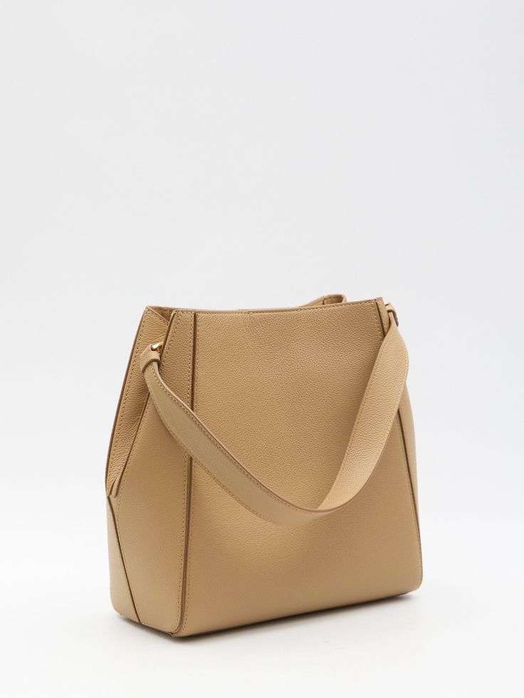 The McGraw bucket bag is made of camel grained leather and showcases the embossed Double T logo on its front. It includes a detachable top handle, adjustable and detachable shoulder strap, press-stud closure, one main interior compartment, and two interior slip pockets. Dimensions: 9.8x10x4.3 inches Size nationality: UNI Product number: 6650832 Product code: 158499227 Composition: 100% leather Beige Pebbled Leather Top Handle Shoulder Bag, Beige Pebbled Leather Shoulder Bag With Top Handle, Beige Pebbled Leather Shoulder Bag With Gold-tone Hardware, Textured Leather Crossbody Bucket Bag For Work, Textured Leather Satchel Bucket Bag For Work, Workwear Textured Leather Bucket Bag Crossbody, Tan Bag With Adjustable Strap For Work, Tan Workwear Bag With Adjustable Strap, Tan Work Bag With Adjustable Strap