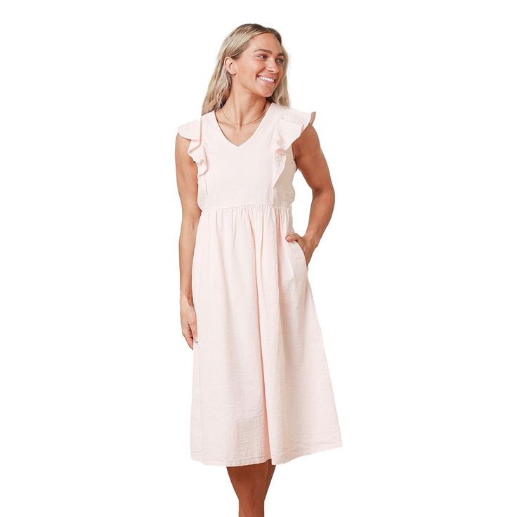 Strike a stunning silhouette in our flutter sleeve dress in soft organic cotton seersucker. Features a flattering cut with a v-neckline, pinafore seams with flutter detail at the front and back, zipper down the center back, and elastic inside the back waistband for a comfortable fit. Fully lined in soft organic cotton batiste. A beautiful light weight dress for all occasions! Relaxed Fit V-neck Dress With Ruffles, Spring Linen Dress With Ruffle Sleeves, Spring Dresses With Ruffles In Relaxed Fit, Feminine Cotton Flutter Sleeve Dress, Feminine Flutter Sleeve Cotton Dress, Feminine Cotton Dress With Ruffle Sleeves, Spring Midi Dress With Ruffles And Relaxed Fit, Spring Midi Dress With Ruffles, Relaxed Fit, Cotton Midi Dress With Flutter Sleeves For Brunch