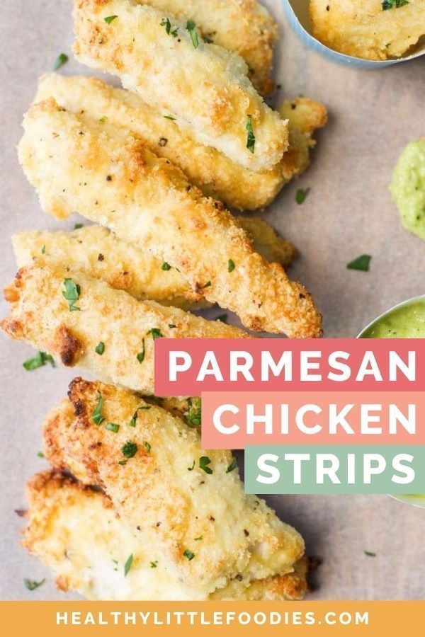 parmesan chicken strips with dipping sauce on the side