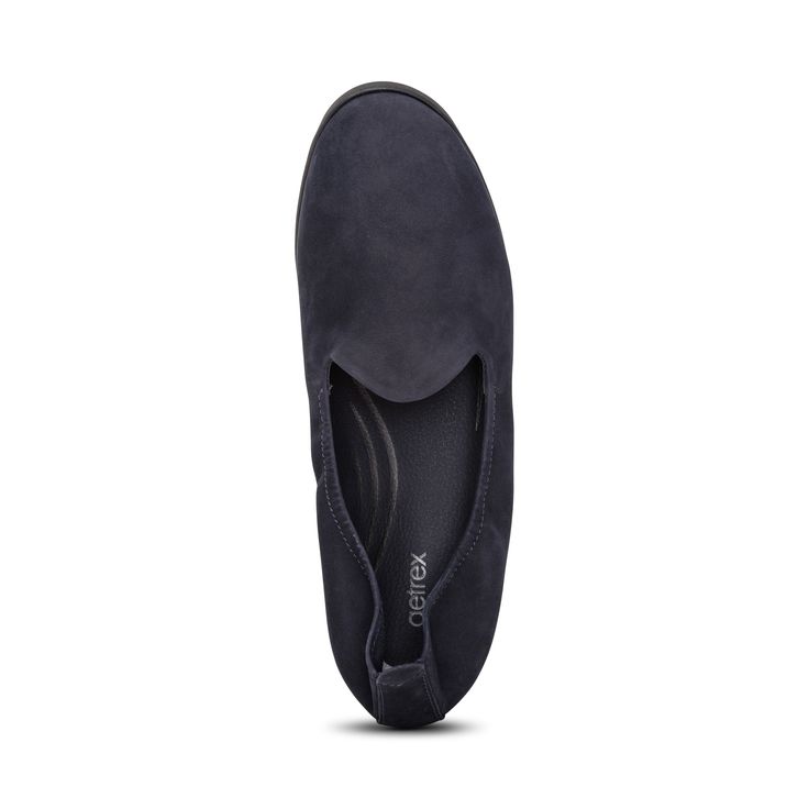 The Aetrex Orthotic System is Built-In to every pair:    Our insole features arch support that helps to stabilize your body, align your feet and relieve common foot pain (ie. plantar fasciitis, heel pain & arch pain)   Our insole features  UltraSKY™; cushioning to provide pressure relief & extra comfort Our insole is lined with microfiber treated with antimicrobial technology to help fight every day odors  Details:Soft Upper with Elastic ToplineUpper Material: LeatherOutsole Material: RubberRemovable Insole: No Heel Height: 1.5" Comfortable Slip-ons With Arch Support And Closed Toe, Functional Slip-ons With Arch Support And Round Toe, Ergonomic Slip-on Walking Shoes With Arch Support, Ergonomic Walking Shoes With Gel Cushioning And Round Toe, Flat Walking Shoes With Arch Support For Sports, Ergonomic Walking Shoes With Gel Cushioning, Sports Walking Shoes With Arch Support Closed Toe, Sports Walking Shoes With Arch Support, Comfortable Slip-ons With Arch Support For Walking