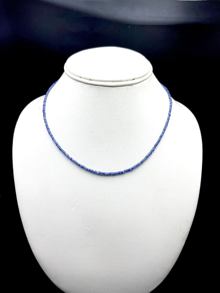 100% Natural Blue Sapphire Faceted rondelle shape beaded necklace with 925 Sterling Silver lobster clasp in metal wire. Details : - Gemstone: Blue Sapphire Calibration of beads: 2.50 millimeters Length: 16.00 inches Gross Weight: 28.05 carats Net Weight: 24.05 carats SKU: SINGLESTR004 100 % NATURAL BLUE SAPPHIRE BEADS FACETED RONDELLE SHAPE BEADS PERFECT CALIBRATED 2.50MM BEADS NECKLACE IN METAL WIRE 925 STERLING SILVER LOBSTER CLASP TOP QUALITY NATURAL BLUE SAPPHIRE RAW MATERIAL USED GENUINE PR Blue Faceted Round Bead Crystal Necklace, Blue Faceted Crystal Necklace With Round Beads, Blue Faceted Oval Beads Jewelry, Blue Faceted Round Bead Necklaces, Faceted Sapphire Briolette Necklace, Faceted Briolette Sapphire Necklace, Blue Faceted Necklaces With Round Beads, Blue Necklaces With Faceted Round Beads, Elegant Sapphire Faceted Beaded Necklaces