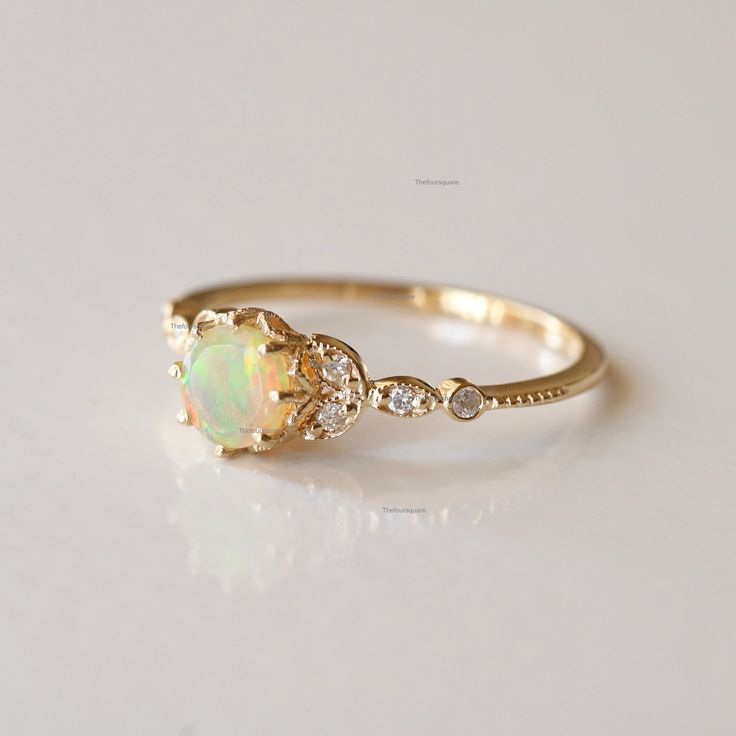 Leaf SI Clarity Diamond Ring, 6mm Opal Milgrain Ring, 14k Yellow Gold Gemstone & Opal Ring, Engagement Stackable Ring, Christmas Gift Fine Handmade Jewelry. This ring set is an ORIGINAL DESIGN by TheFourSquare 14K Gold Ring, Studded Ring, Dainty Wedding Ring, Opal Engagement Ring, Gemstone Ring For Her, Triangle Ring, 14k Gold Ring, Band Ring ★Details 14k Yellow Gold Main gemstone: Opal  Shape: Round Stone Size : 6mm Ring Size ; US 7 SI Clarity Diamond, Natural Quality: SI quality, conflict-free Stackable Yellow Gold Opal Ring For Anniversary, Stackable Opal Ring In Yellow Gold For Anniversary, Opal Ring With Diamond Accents In 14k Gold, 14k Gold Opal Ring With Diamond Accents, Heirloom Style Opal Promise Ring With Round Cut, Heirloom Opal Promise Ring Round Cut, 14k Gold Opal Ring With Halo Design, Gold Opal Ring With Halo Design, 14k Gold Opal Ring With Halo Design For Anniversary