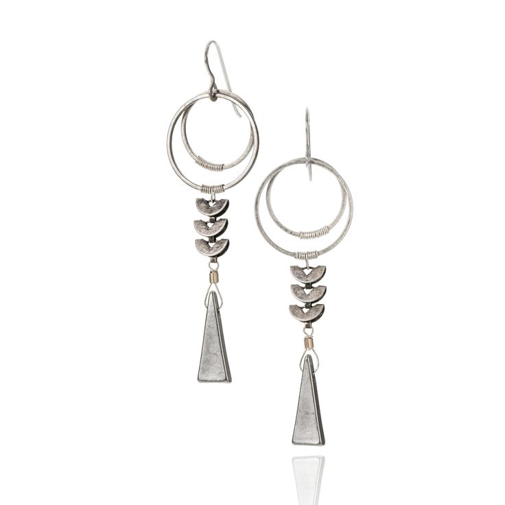 Metal Earrings - Architectural design inspired by the gold jewelry and decorative aesthetic of ancient Egypt. Two overlapping circles of blackened steel and hypoallergenic brass suspend the lower elements with a signature wire wrapping technique.  A set of three unique and custom designed semi-circle shapes form a linear capstone to the elongated triangle that balances out the design for a captivating look. French hook-style ear wires. Nickel-free components. Contemporary Teardrop Metal Jewelry, Elegant Brass Hoop Earrings With Oxidized Finish, Hand Forged Long Drop Modern Earrings, Elegant Oxidized Brass Hoop Earrings, Handmade Contemporary Drop Earrings, Fusion Style Metal Drop Earrings Jewelry, Handmade Contemporary Metal Earrings, Contemporary Handmade Drop Earrings, Handmade Contemporary Brass Jewelry