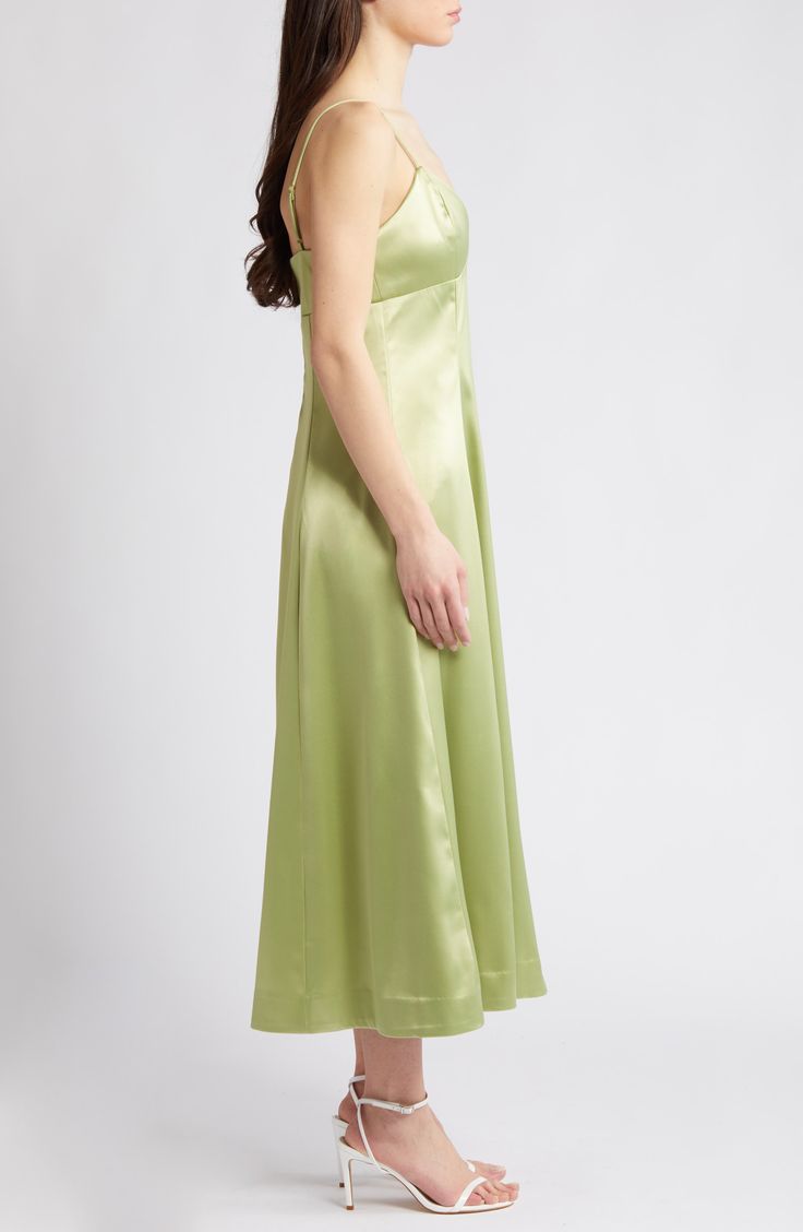 Glossy satin provides a graceful drape to this party-ready dress rendered in a fresh and verdant hue. 41" center front length (size Medium) Sweetheart neck Spaghetti straps 98% polyester, 2% elastane Dry clean Imported Elegant Green A-line Satin Dress, Green Satin A-line Dress, Green Elegant Satin Dress, Green Satin Finish Bridesmaid Dress, Elegant Green Satin Silk Dress, Green A-line Satin Dress, Green Silk Satin Dress For Formal Occasions, Green Satin Finish Evening Dress For Party, Green Bias Cut Slip Dress For Evening