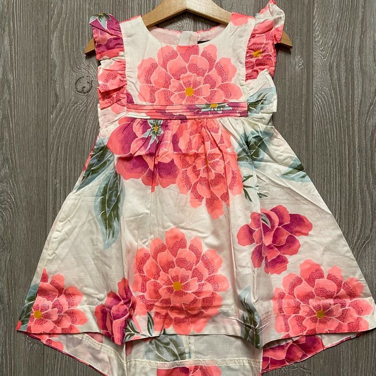 Cute Dress From Tea Collection! It Has An All Over Bright Bold Pink Floral Print, And Ruffles Across The Neck And Down The Shoulders In Back. The Bottom Seam Is High In The Front, Lower In The Back. Lots Of Pretty Detailing! Girls Size 2, Brand New With Tags! If You Have Any Questions At All, Or If You Need Measurements, Please Don't Hesitate To Drop Us A Message! We Are Happy To Help! :) Smoke Free Home. White Sundress For Summer Dress-up, Playful White Sundress For Garden Party, White Sundress For Dress-up In Summer, White Sundress For Dress-up Occasions In Summer, Playful White Floral Print Sundress, White Sleeveless Dress With Ruffles For Dress-up, Playful Floral Print Sleeveless Summer Dress, Playful Printed White Dress, Playful White Printed Dress