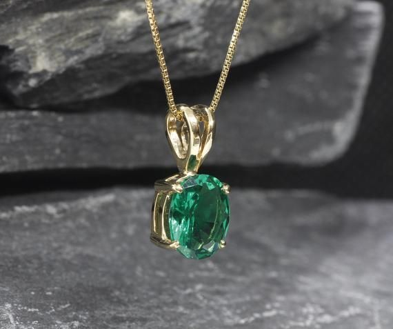 Gold Emerald Pendant Created Emerald Green Oval Pendant | Etsy Oval Emerald Necklace With Diamond Cut, Oval Emerald Diamond Cut Necklace, Green Oval Necklace For Anniversary, Oval Diamond Cut Emerald Necklace For Anniversary, Classic Green Oval Jewelry, Oval Green Emerald Gemstone Necklace, Green Oval Diamond Cut Necklace, Classic Oval Green Emerald Necklace, Classic Green Oval Emerald Necklace