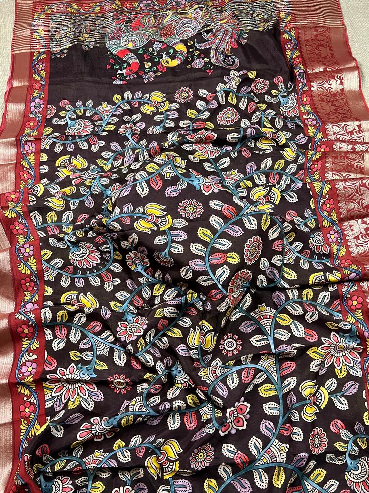 Gorgeous Printed Kalamkari Saree in Pure Chanderi Silk with beautiful blouse piece. Item: Saree Color : Brown Base Fabric: Pure Chanderi Silk Blouse piece : Comes with Blouse piece. Blouse material: Pure Chanderi Silk Work: Kalamkari Prints Fall & Edging: (Yes/No) : Yes Festive Transitional Anarkali Set With Kalamkari Print, Festive Unstitched Anarkali Set With Kalamkari Print, Transitional Kalamkari Print Sets For Puja, Festive Anarkali Dupatta With Kalamkari Print, Unstitched Kalamkari Anarkali Set For Navratri, Festive Salwar Kameez With Kalamkari Print, Festive Kalamkari Print Dupatta, Unstitched Kalamkari Anarkali Set For Diwali, Diwali Semi-stitched Anarkali Set With Kalamkari Print