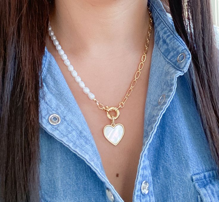 Mother of pearl heart necklace MATERIAL AND SIZE Mother of pearl heart 18k Gold filled chain Medal size:2.5cm Necklace length: 16, 18 or 20 inches If you have questions about the product, feel free to reach me out. Don't forget to check out my other items in the store: Https://www.etsy.com/shop/nyahwithlove White Clavicle Chain Necklace For Valentine's Day, White Chain Necklace For Valentine's Day Gift, Heart-shaped White Chain Necklace For Gift, White Chain Necklace With Adjustable Chain For Valentine's Day, White Adjustable Chain Necklace For Valentine's Day, Elegant White Chain Necklace For Valentine's Day, Trendy White Chain Necklace With Pearl Charm, Trendy White Chain Necklace With Pearl Pendant, Trendy White Necklace For Valentine's Day