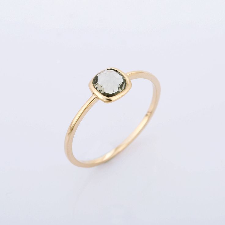 We have Different variety of ring. This unique solitaire ring one of them our beautiful jewelry collection. It will be useful for people born in February month.PRODUCT DETAILSMaterials - 14K Yellow Gold Gemstone - Green AmethystGemstone Shape - CushionGemstone Size - 5.50 mmGemstone weight - 0.55 ctGross Weight - 1.0 GrmShank Width -1.10 mmSetting type - Bezel setting The rings can be made in any size and any gemstone. Customisation available Timeless Amethyst Ring As A Gift, Timeless Amethyst Promise Ring, Heirloom Gemstone Jewelry For Gifts, Heirloom Style Gemstone Jewelry For Gifts, Timeless Amethyst Gemstone Rings, Timeless Amethyst Jewelry Gift, Timeless Birthstone Ring For Gifts, Stackable Yellow Gold Gemstones For Gift, Yellow Gold Gemstone Ring Jewelry