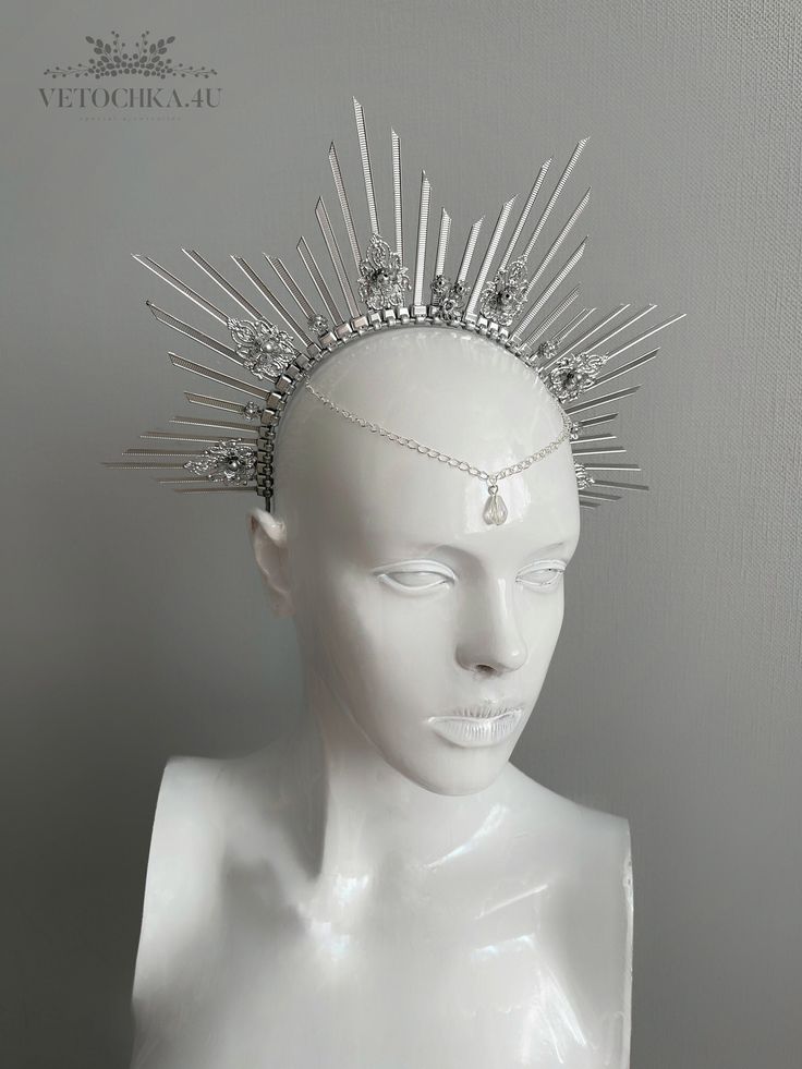 A gorgeous Handmade silver halo crown. Halo crown is made of zip ties in a silver. Headband will be great addition to Met Gala Evening, Celestial Wedding, Party or Festival. The height of the composition is 5 inches (13 cm) The size of this headdress is universal for adult person. It sits soft and comfortable on the head and you can dance and move a long time. Ready to ship in 1-3 business days. All products will be shipped by fast courier company Fedex or UPS and the trucking number will be sen Snowflake Crown, Celestial Headpiece, Christmas Crown, Goddess Crown, Star Goddess, Silver Head Piece, Halo Crown, Halo Headband, Wedding Headdress