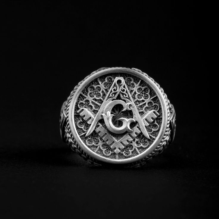 Our Master Mason Symbol Ring is the perfect way to show your pride in being a Freemason. This beautiful ring is handmade from high quality 925 sterling silver, and features the Masonic symbol in detailed relief. It's a stunning piece that is sure to be treasured for years to come. ➤ Item Details * Material: 925K Sterling Silver * Weight: 14-16 grams * Ring Diameter: 2.10 Cm ( 0.83 in) ➤ Shipping Details * Free shipping all over the world. * Processing time: 1-3 business days. * Delivering time: 2-5 business days. (Express Shipping) * The product is sent with a special leather box to avoid damage. ➤ Returns and Exchanges   * If there is a problem with the product or delivery, please do not hesitate to contact us. *If there is a problem with the size of the ring, it will be less than the ret Symbolic Engraved Ring With Intricate Design, Classic Handmade Engraved Ring For Ceremonial Use, Classic Handmade Engraved Ring For Ceremonial Occasions, Symbolic Handmade Engraved Ring Collectible, Symbolic Handmade Engraved Ring, Collectible Round Symbolic Jewelry, Mason Ring, Masonic Symbol, Masonic Gifts