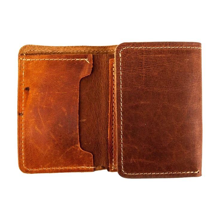 A Truly One-Of-A-Kind BillfoldThe Classics Trifold is handcrafted from vintage baseball glove leather on the front pocket and full-grain steerhide on the back and middle panels. Because every piece of glove leather is unique, when you purchase a Classics Trifold no other person in the world will ever have your same wallet. It's not just a functional accessory; it's a conversation piece. Where Do We Get The Baseball Gloves?FC Goods sources vintage baseball gloves from across America, acquiring gl Vintage Leather Wallets For Everyday, Vintage Leather Wallet With Waxed Finish, Vintage Leather Wallets With Waxed Finish, Classic Trifold Leather Wallet In Cognac, Classic Leather Trifold Wallet In Cognac, Classic Cognac Leather Trifold Wallet, Leather Trifold Wallet With Waxed Finish, Vintage Leather Trifold Wallet With Coin Pocket, Vintage Leather Trifold Wallet For Everyday