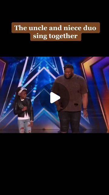 two people standing next to each other in front of a screen with the words, the uncle and niece duo sing together