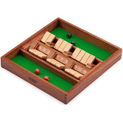 a wooden board game with dices in it