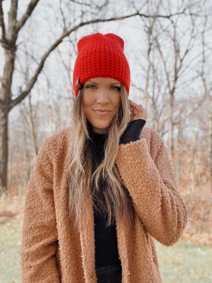 A classic everyday style for any outfit! All the warmth but no bulk. This beanie is a tighter fit, medium weight style. hand crocheted tighter stitch for extra warmth bright red 'Made in Minny' Faux Vegan Leather Tag in whiskey Medium weight, perfect for everyday 100% acrylic Spot clean if necessary, lay flat to dry Cozy Soft Knit Crochet Hat For Fall, Cozy Crochet Hat With Soft Knit For Fall, Warm Cozy Crochet Hat For Fall, Cozy Warm Crochet Hat For Fall, Cozy Crochet Beanie For Fall, Warm Crochet Hat For Fall, One Size Fits Most, Soft Knit Crochet Hat For Winter, Fitted Fall Beanie, Soft Knit Crochet Hat One Size For Fall