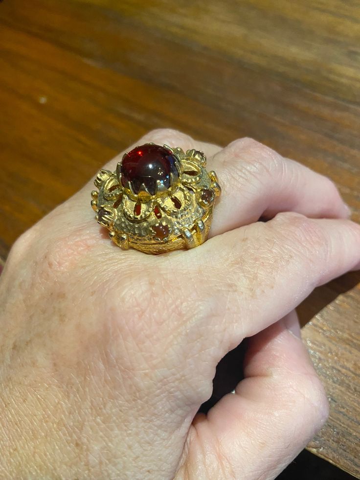 Vintage red antique glass golden bronze ring Lovely vintage golden bronze setting Size 9 My jeweler would re size for $20 fee All rings are shipped in a nice gift box. Check out our over a THOUSAND great reviews Engraving is $4 per letter and is not always perfect depending on the piece. It can take a few days if the jeweler is busy. This is payable to Paypal Judithsltd@gmail.com Bronze Ring, Moonstone Stone, Red Band, Vintage Jewels, Red Ruby, Antique Glass, Gold Style, Vintage Rings, Fashion Item