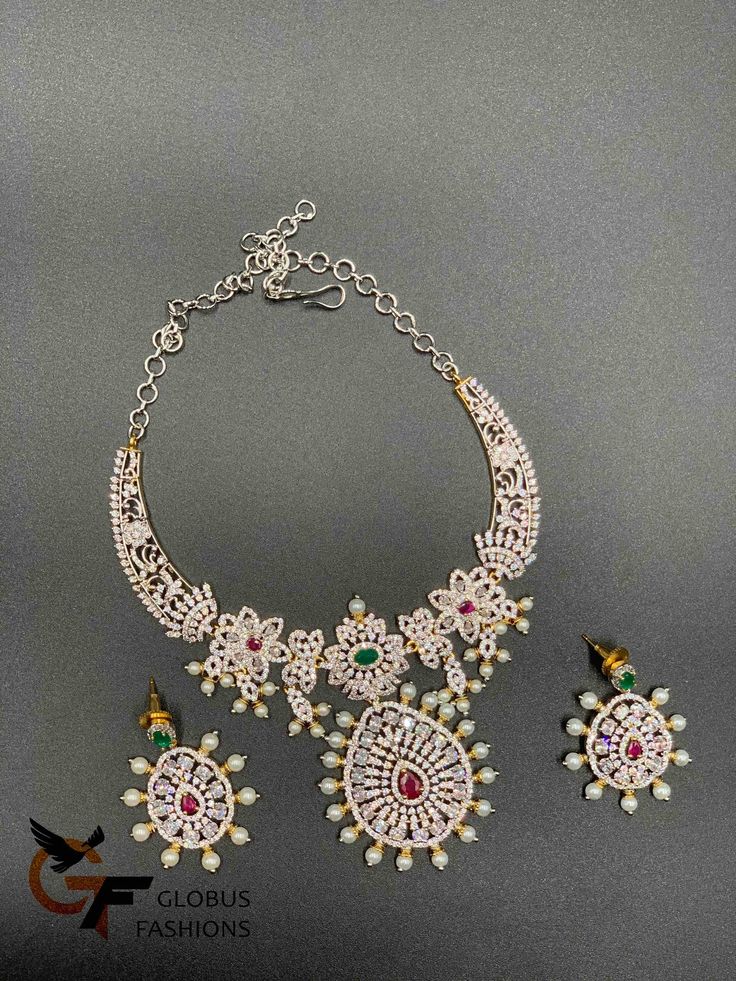 Elegant design cz stones with pearls silver and gold look necklace set Handmade jewelry Silver-plated jewelry One gram gold jewelry Official Website globusfashions.com 🌸 S H O P . M O R E . S T Y L E S 🌸 https://www.etsy.com/shop/Globusfashions Necklaces - https://www.etsy.com/shop/Globusfashions?section_id=18712263 Bracelets - https://www.etsy.com/shop/Globusfashions?section_id=18969767 Pendant Sets - https://www.etsy.com/shop/Globusfashions?section_id=18707402 Tikka - https://www.etsy.com/sh White American Diamond Party Necklace, Silver Kundan Necklace With Cubic Zirconia For Celebration, Silver Kundan Necklace With Elegant Cubic Zirconia Design, Silver American Diamond Necklace With Stone Setting, Festive White Cubic Zirconia Necklaces, Silver Gold Plated Bridal Necklace For Party, Silver Diamond Necklace With Stone Work For Gift, Silver Gold-plated Bridal Necklace For Party, White Stone Work Necklace For Anniversary