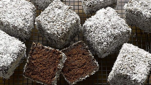 there are many chocolate cakes on the cooling rack