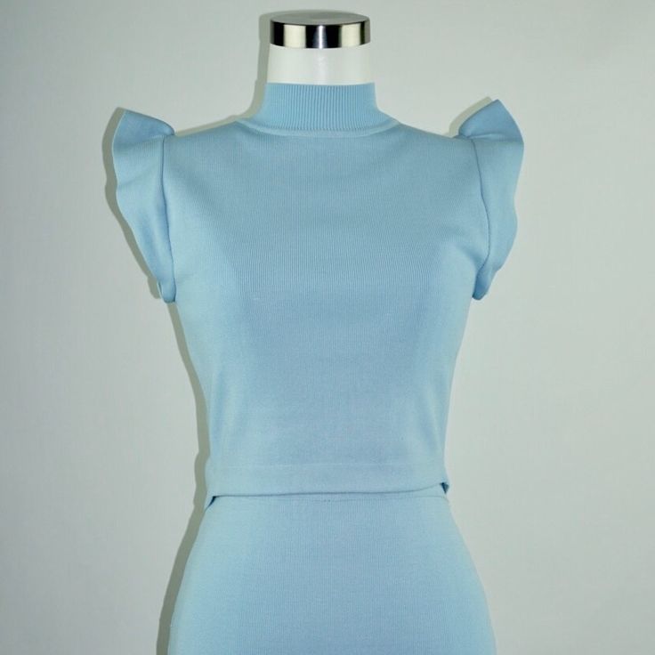 Set Includes Crop Top And Skirt. Elegant Light Blue Stretch Dress, Chic Fitted Light Blue Mini Dress, Chic Light Blue Stretch Mini Dress, Elegant Light Blue Top For Evening, Blue Mini Dress For Office In Spring, Elegant Stretch Light Blue Top, Chic Light Blue Mini Dress, Elegant Light Blue Tops For Night Out, Elegant Light Blue Stretch Top