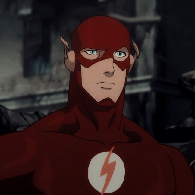 the flash standing in front of an evil looking man with horns and eyes wide open