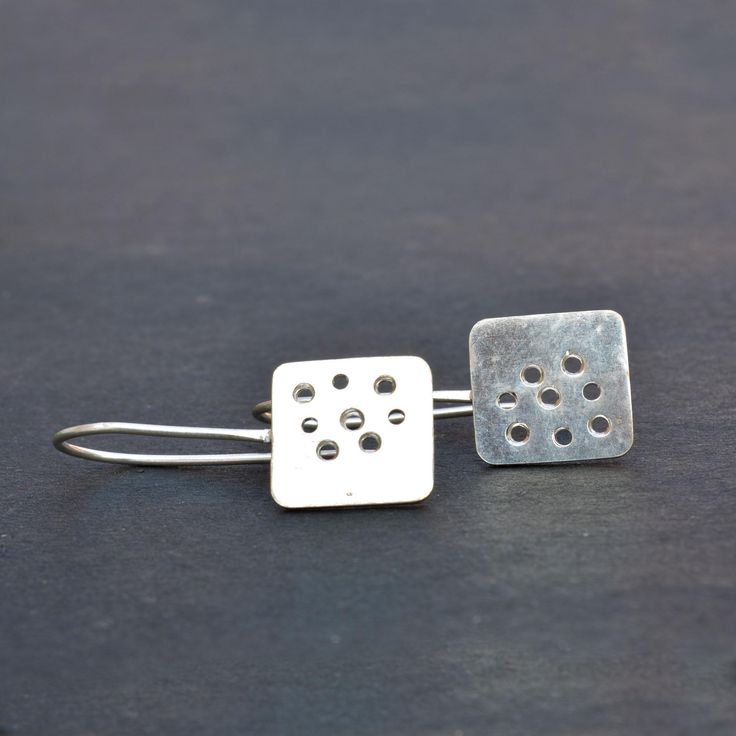 These Modern and Classic Dangle Earrings are made of 925 sterling silver, They are simple, stylish, and sleek. These Geometric Square porous disc Earrings are handmade. They are lightweight so It won't even feel like you're wearing earrings, but you'll still standout. a ear-wire is soldered at the top of each square disc which allows them to free movement. Stuff Type: Square Disc Dangle Earring Metal : 925 Sterling silver Benefits of silver: According to study, wearing silver has helped in balan Minimalist Silver Linear Earrings For Gift, Hypoallergenic Sterling Silver Linear Earrings As Gift, Modern Sterling Silver Linear Earrings As Gift, Simple Sterling Silver Pierced Earrings, Modern Sterling Silver Earrings As Gift, Minimalist Sterling Silver Linear Earrings As Gift, Simple Sterling Silver Drop Earrings, Minimalist Sterling Silver Linear Earrings For Gift, Everyday Hypoallergenic Sterling Silver Linear Earrings