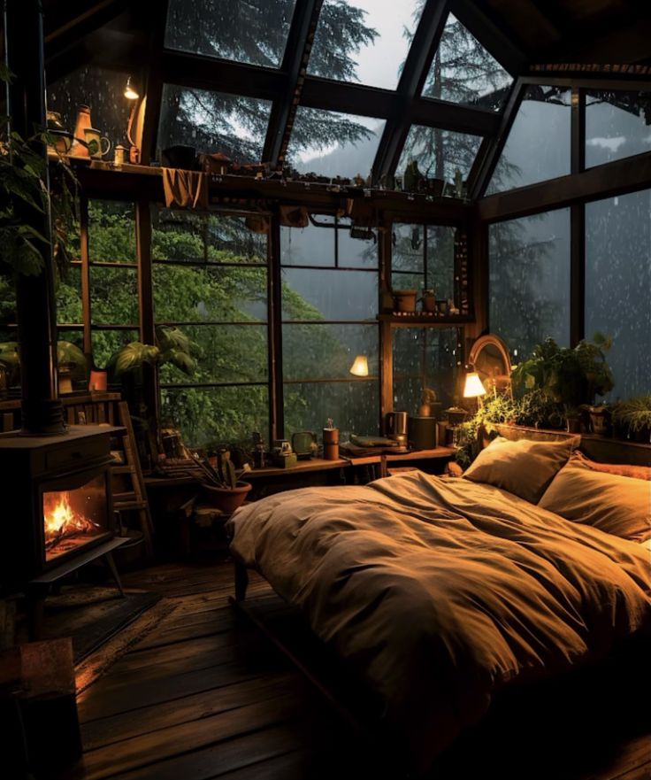 a bed sitting inside of a bedroom next to a window filled with lots of windows