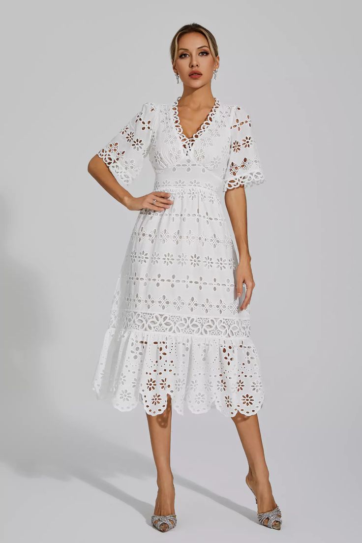 Summer V-neck Lace Dress, White Hollow Out Dress For Wedding, White Hollow-out Wedding Dress, Elegant Lace Maxi Dress With Hollow Out Details, White Scalloped Lace Beach Dress, White Lace Dress With Lace Trim, Elegant Hollow Out Crochet Dress For Vacation, White Lace Dress With Broderie Anglaise, Elegant Fitted Lace Dress With Broderie Anglaise