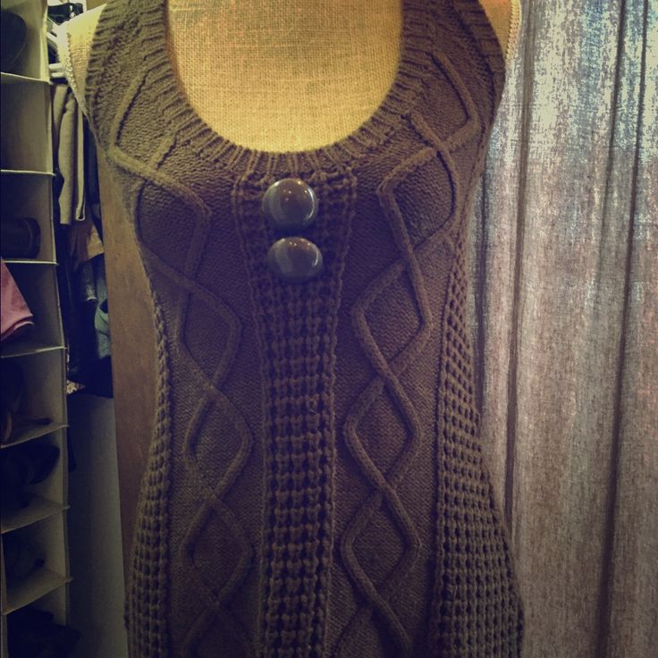 Unique Brown Knit Sleeveless Sweater. Fitted Cable Knit Sleeveless Vest, Fitted Sleeveless Cable Knit Vest, Cozy Fitted Cable Knit Sweater Vest, Fitted Cable Knit Sleeveless Sweater Vest, Fitted Sleeveless Cable Knit Sweater Vest, Cozy Cable Knit Sleeveless Sweater Vest, Fall Fitted Knitted Tank Top, Cozy Sleeveless Cable Knit Sweater Vest, Fitted Knitted Sleeveless Sweater Vest