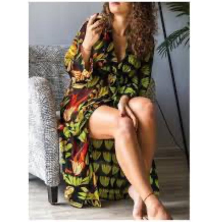 So Gorgeous! 100% Polyester. Chic V-neck Midi Dress With Tropical Print, Black Printed Maxi Dress, Black Printed Maxi Dress For Party, Flowy V-neck Tropical Dress, Flowy Tropical V-neck Dress, Tropical V-neck Party Dress, V-neck Tropical Print Party Dress, Black Printed Maxi Dress For Brunch, Chic Black Printed Maxi Dress