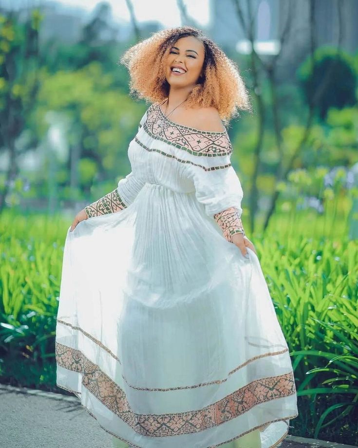 Handwoven Habesha Kemis Beautiful Habesha Dress Ethiopian traditional dress Eritrean Dress ሀበሻ ቀሚስ ሀበሻ ልብስ Bohemian Ceremonial Dresses With Woven Motifs, Ceremonial Bohemian Maxi Dress With Traditional Patterns, Bohemian Maxi Dress With Traditional Patterns For Ceremonial Occasions, Bohemian Dresses With Woven Motifs For Festive Season, Traditional Long Sleeve Maxi Dress For Festivals, Bohemian Festive Dress With Woven Motifs, Festive Bohemian Dress With Woven Motifs, Traditional Embroidered Floor-length Dress For Ceremonies, Traditional Floor-length Embroidered Dress For Ceremonies