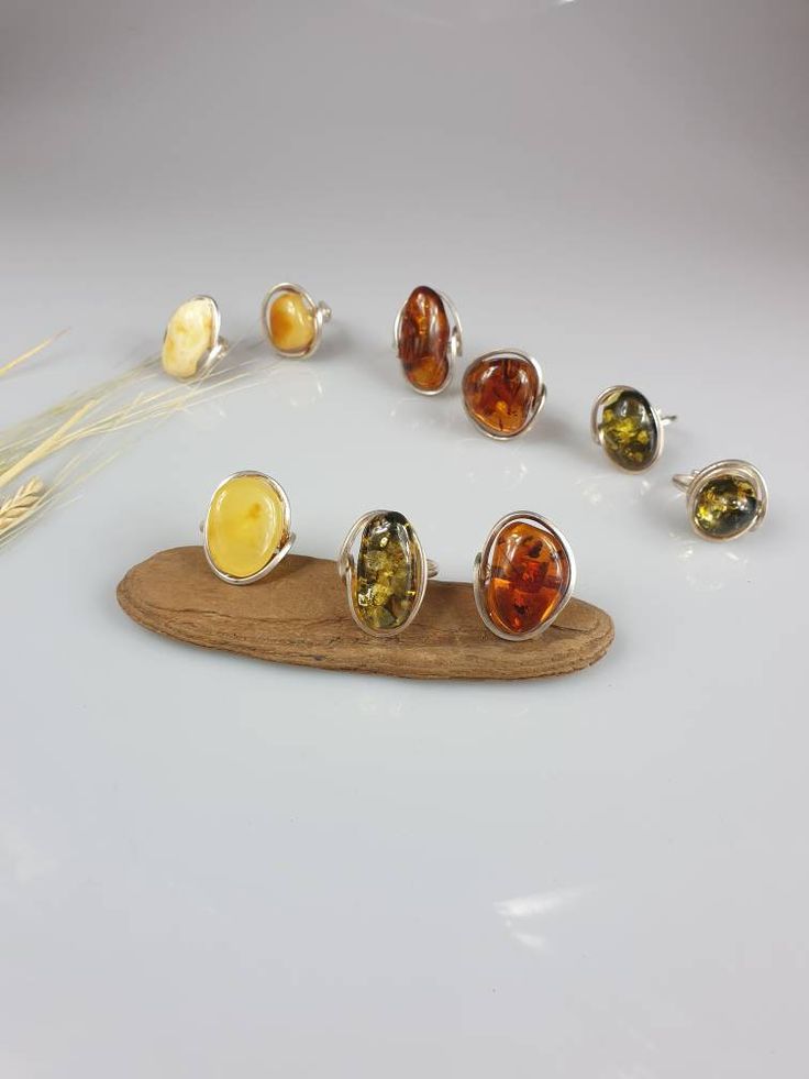 Amber ring. Silver plated genuine Amber ring. Green, white or brown colour available. Adjustable size Stone size 2,5-3 cm ( 0,98-1,18 inch) This item was made of natural Baltic Amber. All the amber used in my jewelry is collected in my home country Lithuania. I sell only genuine, authentic, real, natural Baltic Amber. Item may have natural imperfections. Due to amber being natural, each of my jewelry is unique and even the same models can be slightly different. Please contact me for more details Baltic Amber Ring For Anniversary, Elegant Baltic Amber Rings As Gift, Unique Amber Ring As A Gift, Elegant Baltic Amber Rings For Gifts, Amber Gemstone Rings For Jewelry Making, Amber Crystal Ring Gift, Unique Amber Ring, Oval Baltic Amber Rings In Amber Color, Handmade Amber Crystal Ring For Gift