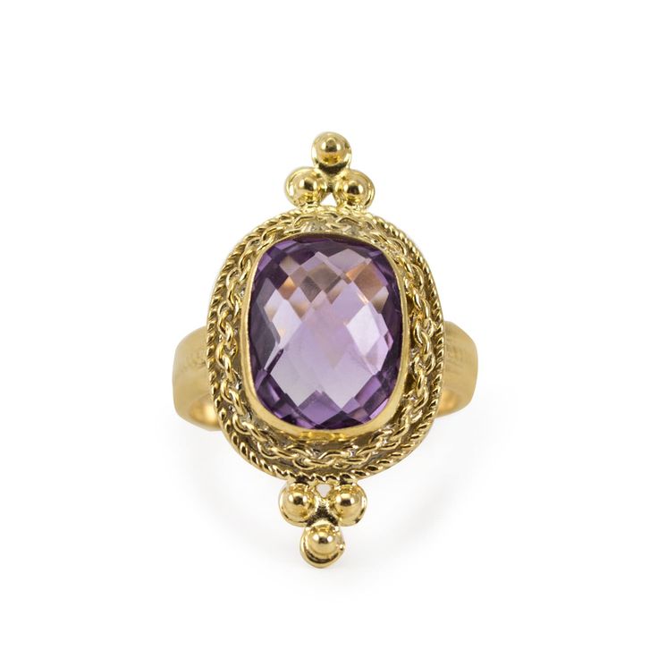 Inspired by the alluring designs of antique jewelry styles, the Juno Amethyst Ring is cast from 18 kt gold over sterling silver and set with a genuine 14mm. rectangular faceted Amethyst cabochon that is bezel-set in a handmade twisted frame. Understated and elegant, this 100% handmade in Italy 18 kt Gold Over Sterling Silver ring is perfect to be stand out of the crowd on any special occasion. Presented in a Vintouch Italy signature packaging. Vintouch Jewelry pieces are extremely resistant and Classic Yellow Gold Rectangular Amethyst Ring, Elegant Rectangular Amethyst Ring In Yellow Gold, Luxury Gold Amethyst Ring With Bezel Setting, Luxury Purple Amethyst Rectangular Ring, Elegant 14k Gold Rectangular Amethyst Ring, Luxury Purple Rectangular Amethyst Ring, Luxury Purple Amethyst Ring, Rectangular Shape, Luxury Rectangular Amethyst Ring, Elegant Rectangular Amethyst Ring