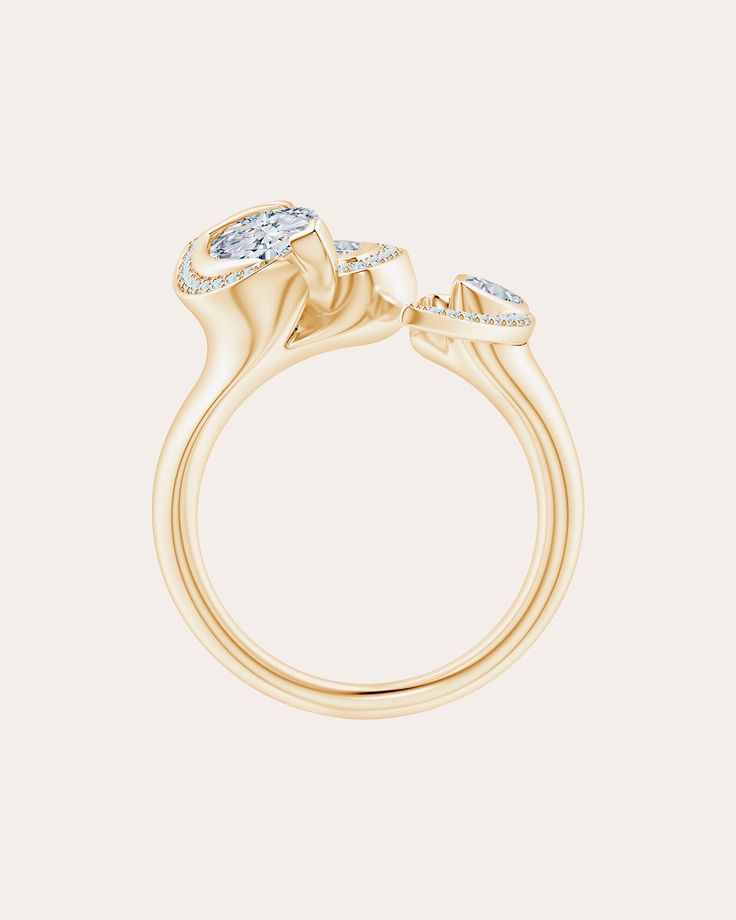 Elegant and feminine, this sculpted band is crafted from 14k yellow gold and features an array of marquise-cut diamonds and petite diamond trim. This item is final sale. 14k yellow gold and diamond Diamond: 0.53 tce Spot clean Made in Bangkok Luxury Yellow Gold Cluster Ring With Rose Cut Diamonds, Luxury Marquise Cubic Zirconia Diamond Ring, Luxury Cubic Zirconia Marquise Diamond Ring, Luxury Marquise Cut Cubic Zirconia Cluster Ring, Luxury Cluster Yellow Gold Diamond Ring, Luxury Marquise Cluster Ring For Anniversary, Luxury Marquise Yellow Gold Diamond Ring, Luxury Marquise Diamond White Diamond Ring, Elegant Marquise Diamond Ring With Pave Setting