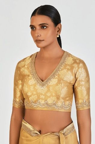 Gold yellow silk blouse with marodi and gold zari embroidery. - Aza Fashions Traditional Gold V-neck Tops, Elegant Semi-stitched Tops For Diwali, Gold V-neck Blouse For Wedding, Festive Anarkali V-neck Top, Diwali Gold Embroidered Saree, Elegant V-neck Tops With Zari Work, Gold V-neck Bollywood Blouse Piece, Festive V-neck Tops With Zari Work, Elegant V-neck Top With Zari Work